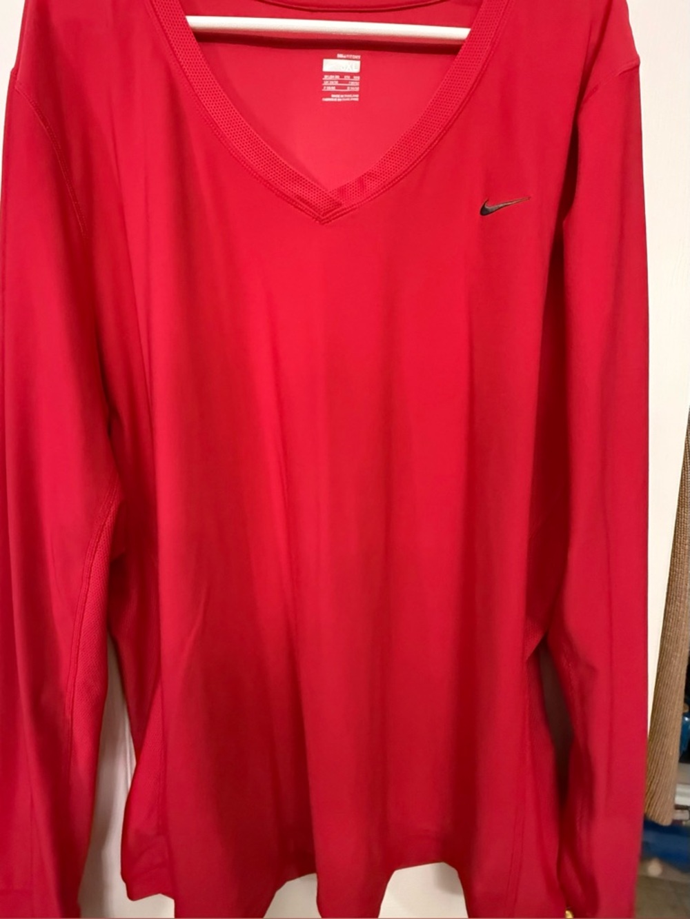 Women’s Nike Dry Fit Pink V-Neck Long Sleeve Athletic Top with thumb holes